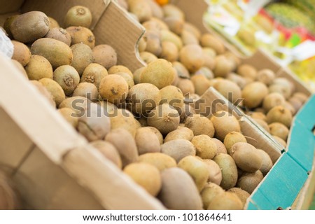 Kiwi fruit in boxes in supermarket