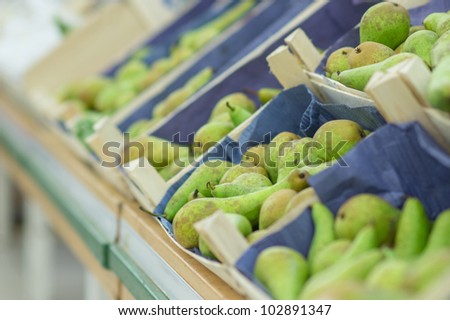 Pears in boxes in supermarket
