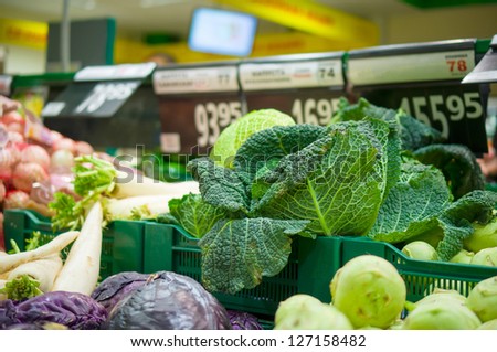 Savoy cabbage on box in supermarket