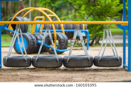 Swinging road of old tires on kids playground
