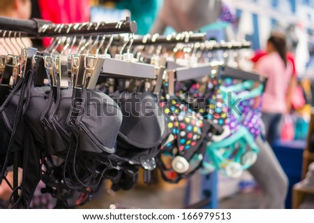 Variety of Sport bra on stand in store