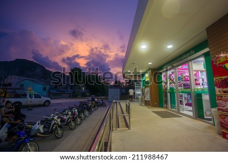 Ao Nang, 3 June 2014: Tesco Lotus local shop and parking on sunset at Ao Nang, Krabi province, Thailand.