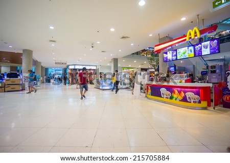 Phuket, 22 May 2014: First floor of Central Festival mall with McDonalds cafe and escalator at Phuket Town, Phuket province, Thailand.