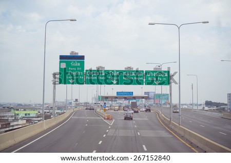 Bangkok, Thailand - 27 December 2014. Toll gate plaza on elevated highway in Bangkok, Thailand.