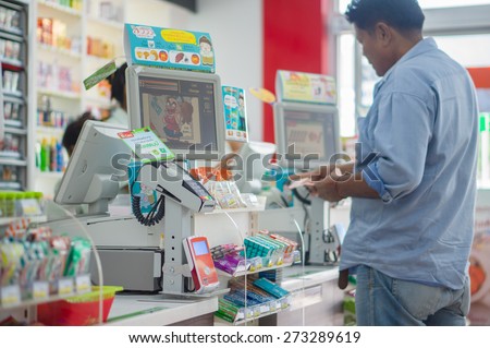 Phang Nga, 21 october 2014: 7-Eleven shop with cash desk at gas station in Phang Nga town, Phang Nga province, Thailand.