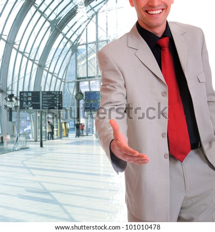 Businessman giving his hand for handshake