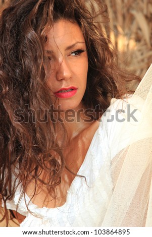 Young woman relaxing at summer lounge bar