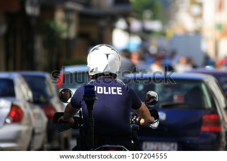 Greek policeman on motor bike