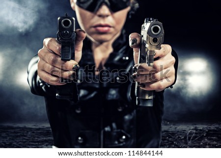 special  tactics sexy woman holding up her weapon
