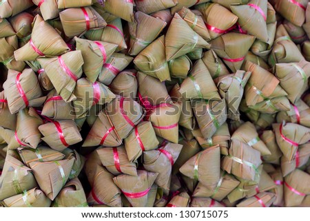 steamed rice dough with sweet coconut stuffing. Thai dessert. also called \