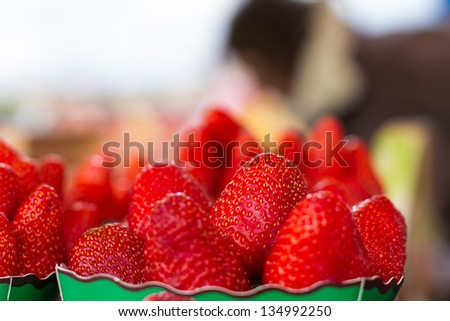 close up of strawberry on market stand
