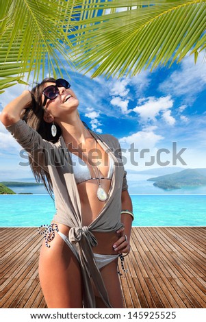 Woman at luxury summer resort in Greece