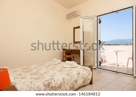 Bedroom of a private villa in Greece