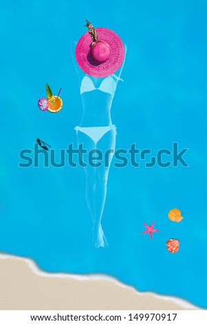 Top view of a woman silhouette with  beach items in the swimming pool