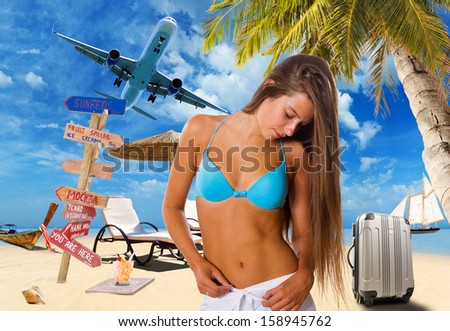 YOung woman on the beach Travel concept