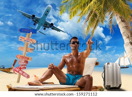 Man on the tropical beach Travel concept