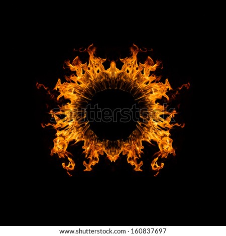 Blazing flames circle over black background