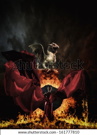 Glamour woman in red dress and dragon