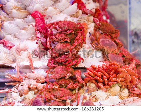 Fresh seafood in fish market in Paris France - food background