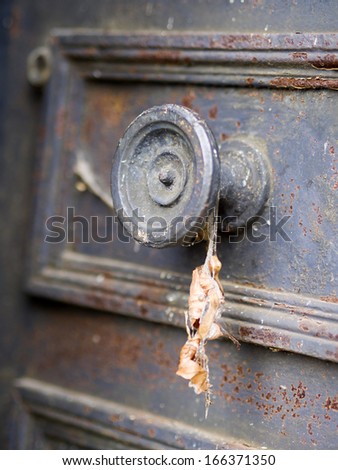 decaying door at Pere Lachaise Cemetery in paris narrow DOF