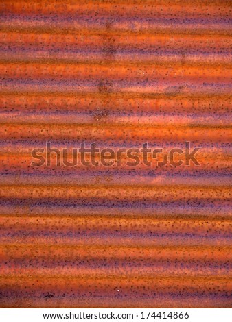 Rusty curtain door with loose paint