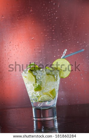 Mojito cocktail with fresh lime at the club