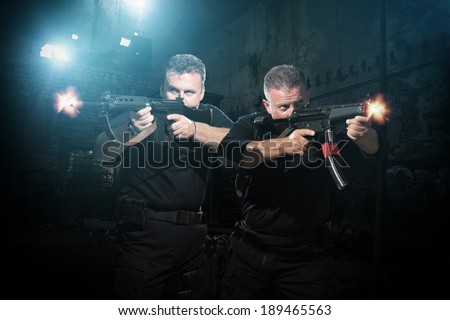 Law enforcement officers special tactics team in action