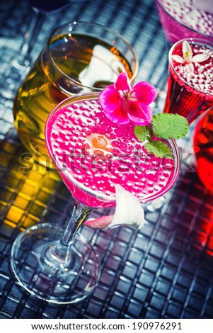 Molecular mixology - Cocktail with caviar and flower petals