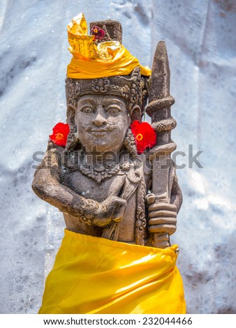 Stone sculpture on entrance door of the Temple in Bali Indonesia