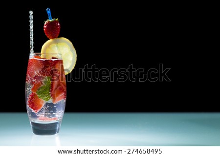 Mojito cocktail with fresh strawberry  at the club