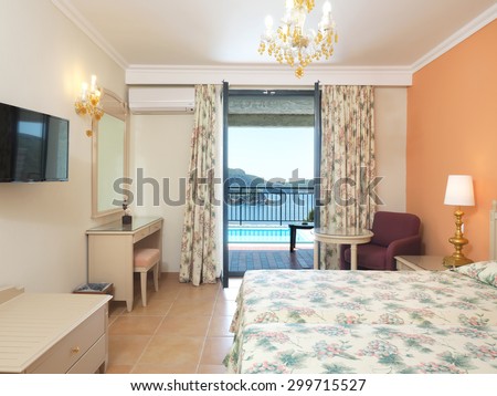 Luxurious hotel room interior with sea view