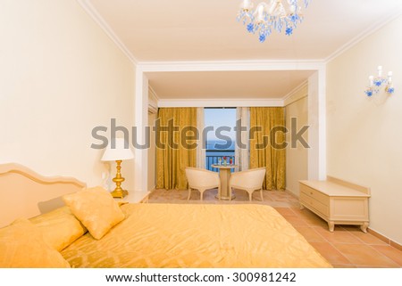 Luxurious hotel room interior with sea view