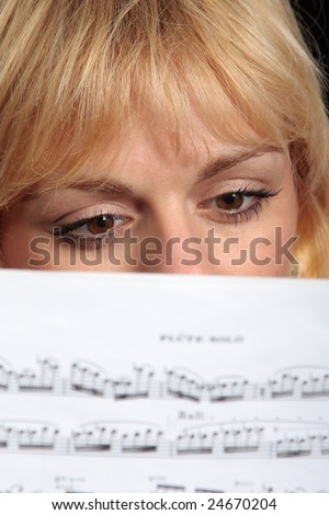 Woman reading a music score