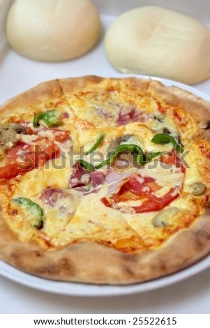 Hot fresh deluxe pizza. Right out of the oven and ready to eat