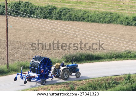 The tractor on the road