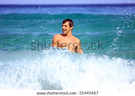 young man and water of ocean