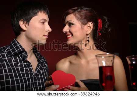 Attractive young couple having romantic dinner