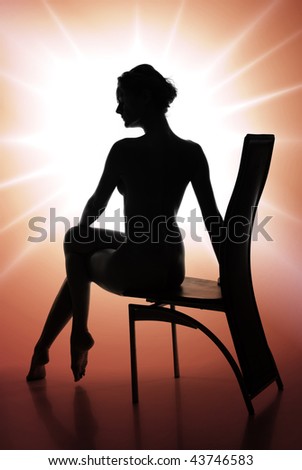 Outlines of a beautiful young woman on brown background
