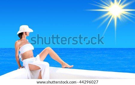A Beautiful Woman relaxing on beautiful shoreline