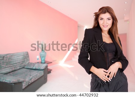 A beautiful female hotel manager in the lobby