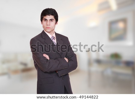 A handsome male hotel manager in the hotel room