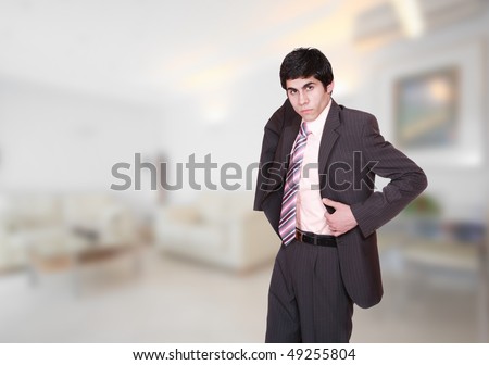A handsome male hotel manager in the hotel room