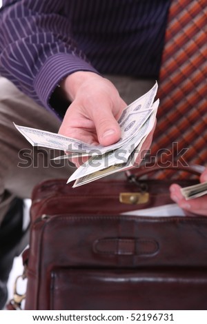 business man with money isolated in white background