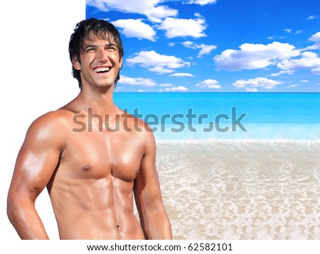 Handsome man  with ideal beach landscape  - Clipping path on the man easy to cut him out - perfect for travel agencies