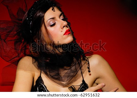 stock photo A beautiful sexy women on red background