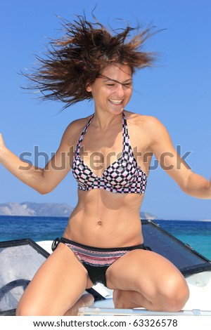 beautiful girl on speed boat - Motion blur