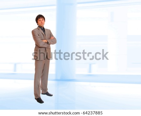 Business man on light business background