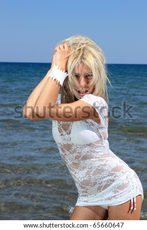 A beautiful young woman at the beach in Greece