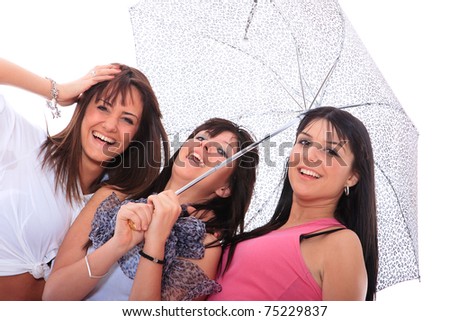Three beautiful girls are standing under the umbrella. isolated on white background
