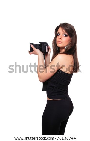 Female photographer with DSLR Camera taking pictures over white background